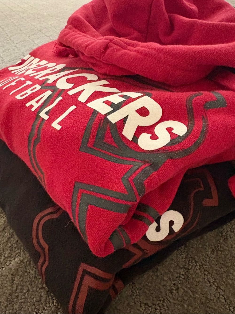 One Red and One black Firecrackers Softball hoodie bundle